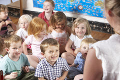 montessori-pre-school-class-listening-to-teacher-o-10971766